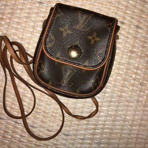 Louis Vuitton small cross-body bag.